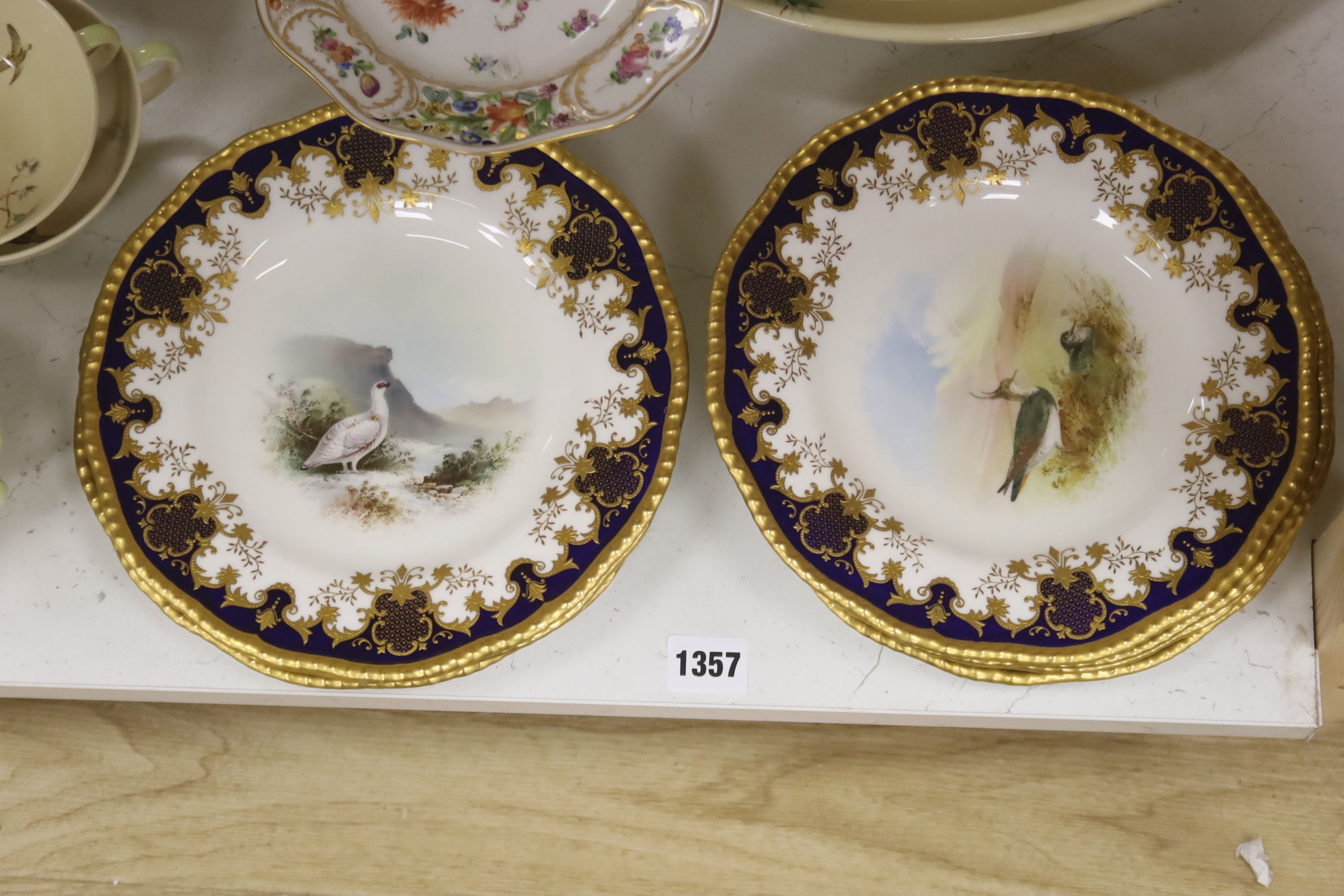 A set of six Coalport game bird plated plates and a Royal Doulton 'The Coppice' pattern part dinner service